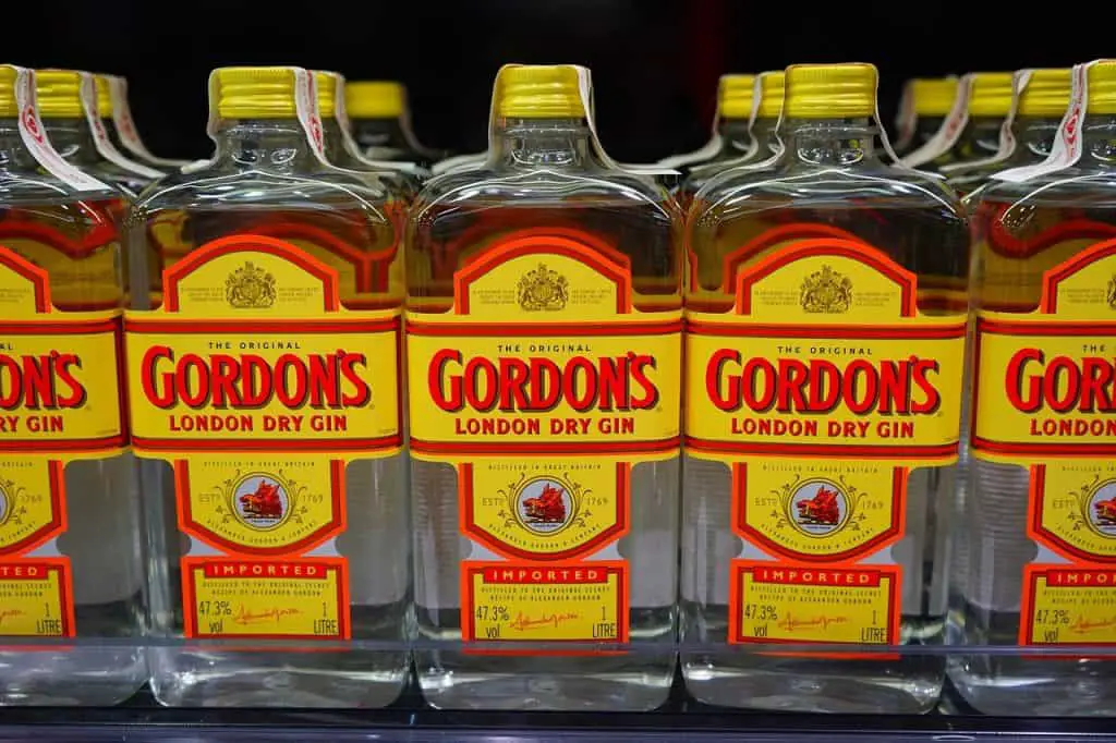 Rows of Gordon's London dry gin bottles next to each other.