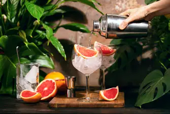 Gin being mixed with blood orange which is a great idea on what to mix with London dry gin.